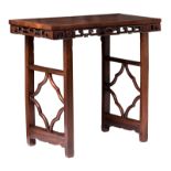 A Chinese carved hardwood side table, H 77 - W 90 - D 37 cm