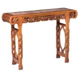 A Chinese carved wooden dragon decorated side table with marble top, H 91 - W 120 - D 38 cm