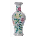 A Chinese polychrome baluster shaped vase, decorated with chrysanthemums and butterflies, H 44,5 cm