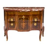 A second half of the 18thC early Neoclassical French rosewood and kingwood chest of drawers with