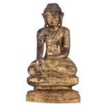 An Oriental gilt lacquered wooden seated Buddha, H 50 cm