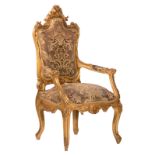 An imposing Italian Rococo revival sculpted and gilt wooden armchair, H 131 - W 75 - D 60 cm