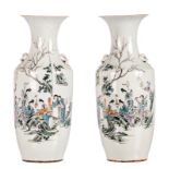 A pair of polychrome decorated Chinese vases, with an elegant garden scene and calligraphic texts, H