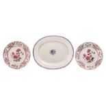 Two Chinese famille rose floral decorated export porcelain dishes, 18thC; added a ditto blue and