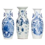 Three Chinese celadon ground blue and white vases, two decorated with birds on flower branches,