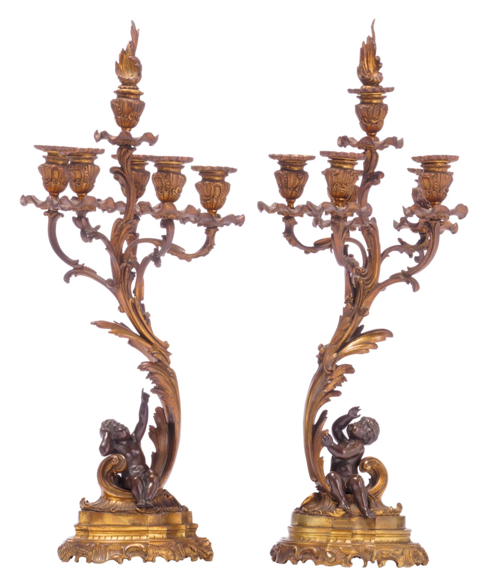 A second half of the 19thC pair of Rococo revival patinated bronze candlesticks, H 66 cm