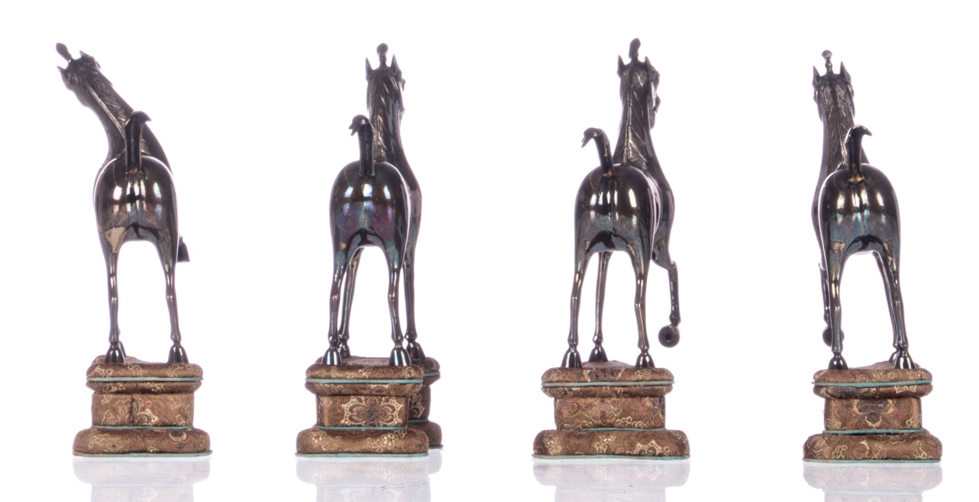 Four Chinese sterling silver horses, standing on a textile covered base, 20thC, H horses 11,4 - H - Image 4 of 6