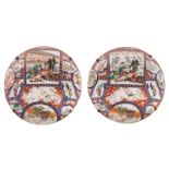 Two large brocade enamel Imari polychrome floral decorated Japanese chargers, the roundels with