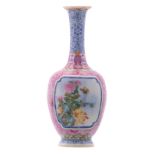 A Chinese famille rose miniature bottle vase, floral decorated, the roundels with a rock, a