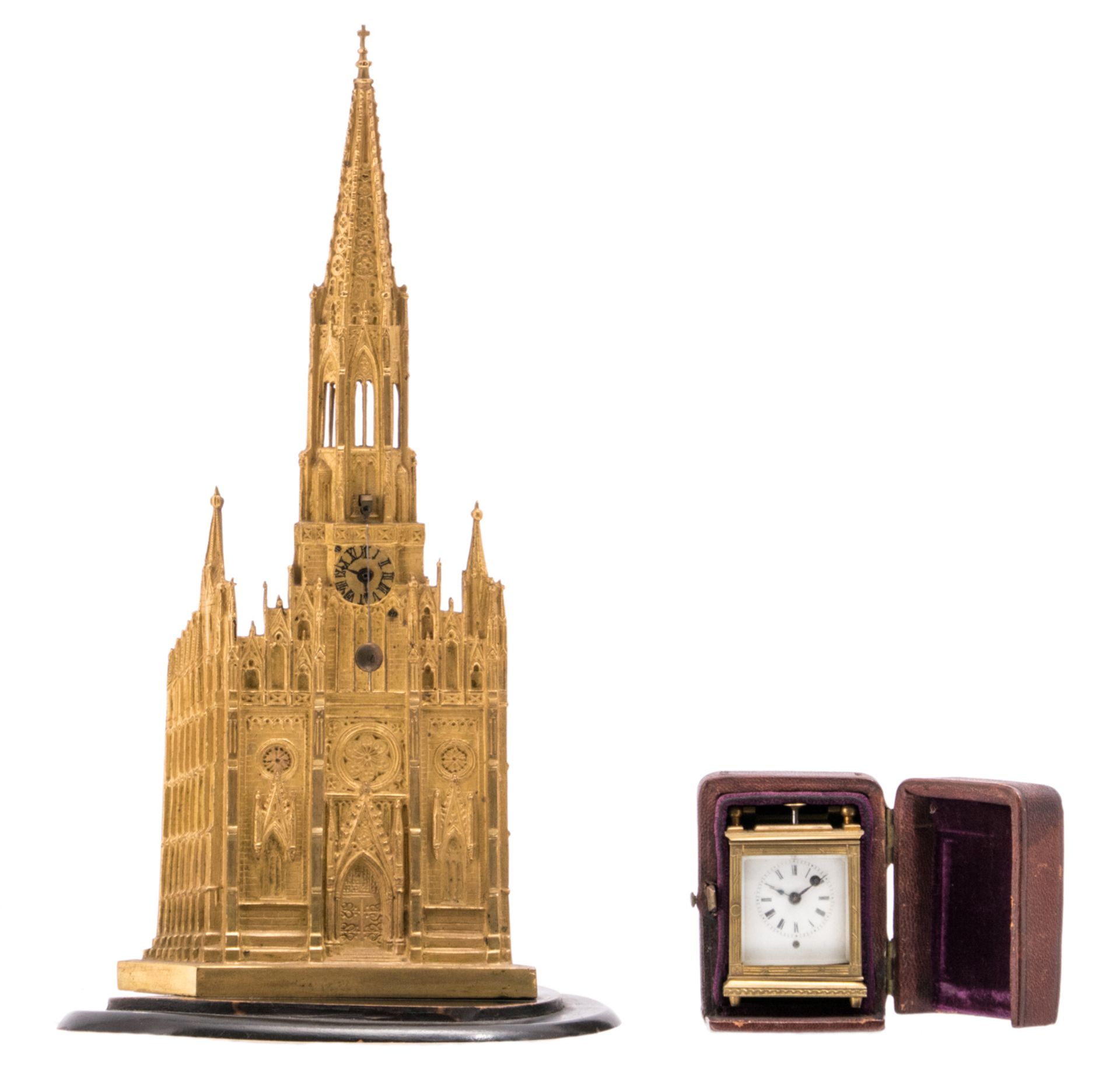 A 19thC gilt bronze miniature clock à la cathédrale; added a 19thC gilt bronze Historism small table