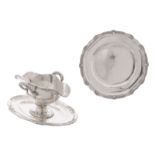 A silver Rococo style dish, 950/000, marked Delheid; added a matching silver sauce boat, 800/000,