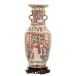 A Chinese Canton famille rose vase, decorated with auspicious symbols and floral motifs, the