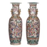 A pair of impressive Chinese famille rose vases, relief decorated with dragons and phoenix, the