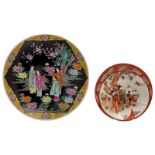 Two Japanese polychrome and famille rose floral decorated plates with a gallant scene, both