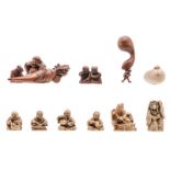 A lot of seven Japanese ivory netsuke / okimono and three ditto wooden okimono, all depicting