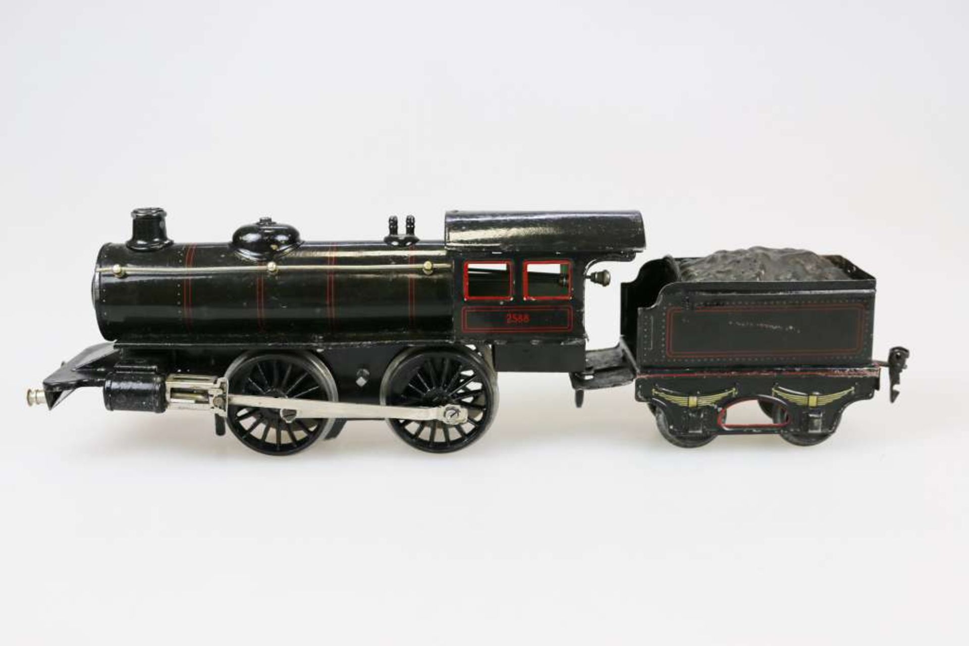 MÄRKLIN, alte Spur 1, Dampflok mit Tender, Modell 2588, Uhrwerkantrieb um 1920. Schwarz und rot