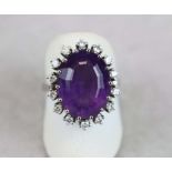 Damenring, 585er Weissgold, Ringkopf ausgefasst mit oval facettiertem Amethyst von ca. 8 ct.,