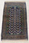 Teppich, wohl Turkmene, Ende 19./Anf. 20. Jh. , Maße: 205 x 114 cm. Gebrauchsspuren.