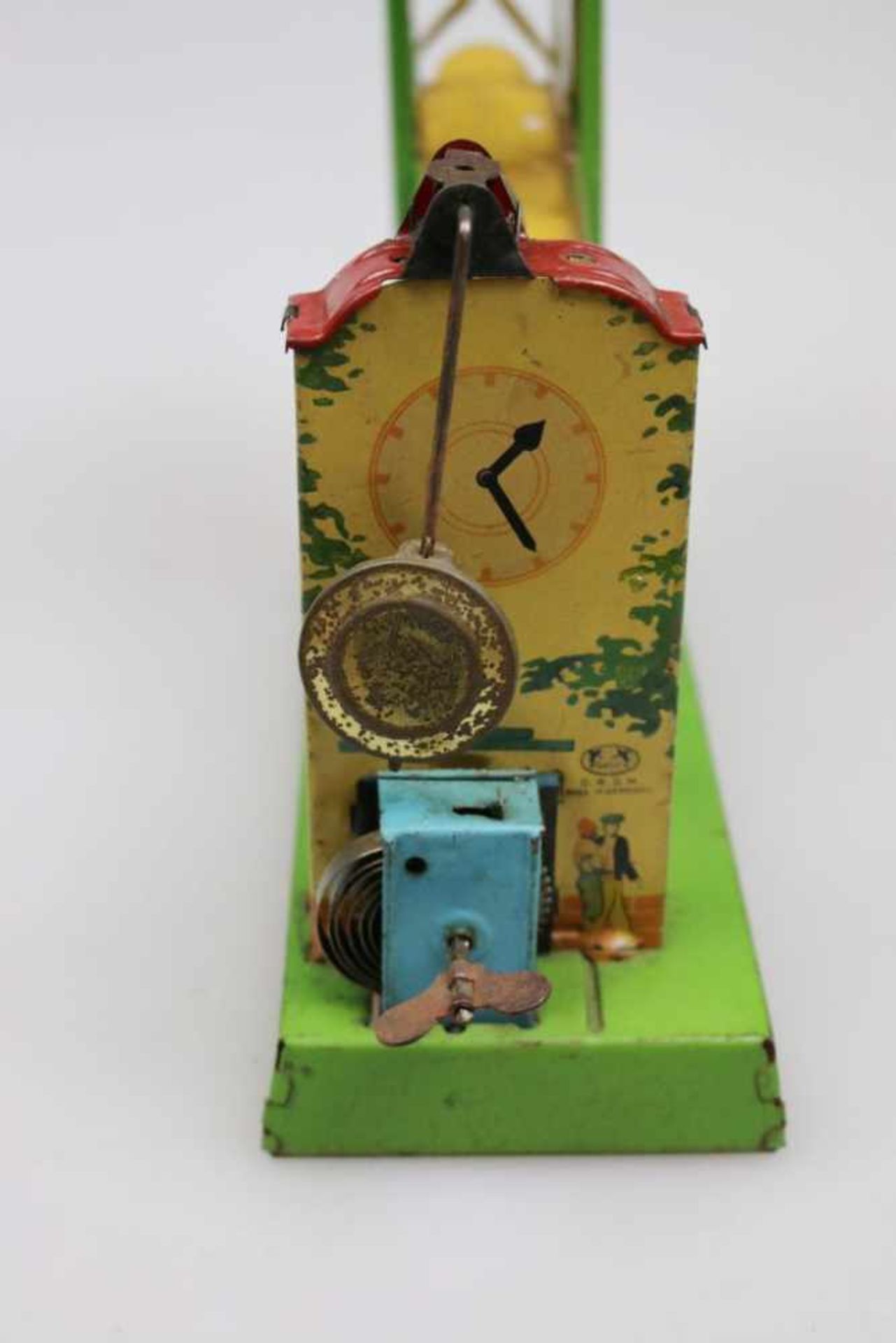 Gely, Kugelspiel mit Uhrwerk, farbig lithographiertes Blech. Guter Zustand mit Alters- und - Bild 2 aus 2