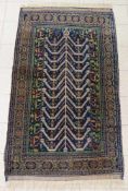 Teppich, wohl Turkmene, Ende 19./Anf. 20. Jh. , Maße: 205 x 114 cm. Gebrauchsspuren.