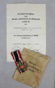 Kriegsverdienstkreuz 1939 2. Klasse mit Schwertern in großer Verleihungstüte und Urkunde.