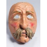 Holz-Maske, wohl alpenländisch, Mitte 20. Jh., plastisches Gesicht mit Schnurrbart, polychrom