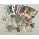 Konvolut Münzen und Telefonkarten, 64-tlg., unterschiedliche Länder, Materialien, Formen und Größen,