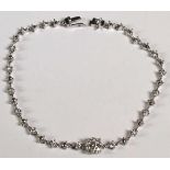 Armband, WG 750, Facon: Phantasie, besetzt mit zahlreichen Brillanten, zus. ca. 1,40 ct., weiß,