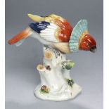 Porzellan-Tierplastik, "Vogel", wohl Thüringen, 1. Hälfte 20. Jh., auf mit plastischen Blümchen- und