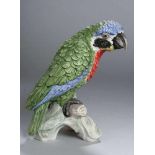 Bisquitporzellan-Figur, "Papagei", Goebel, 2. Hälfte 20. Jh., Mod.nr.: CV 79, auf blattbewachsenem