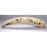 Große Elfenbein-Schnitzerei, Afrika, um 1900-20, aus langem, gebogtem, hohlem Stoßzahn beidseitig