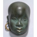 Messing-Wandmaske, "Afrikanischer Kinderkopf mit Ohrring", Hagenauer, Wien zugeschrieben, 1.