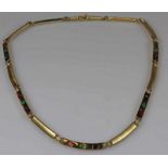 Halskette, GG 585, teils mattiert, je 7 facettierte Rubine, Smaragde, Saphire, kleiner