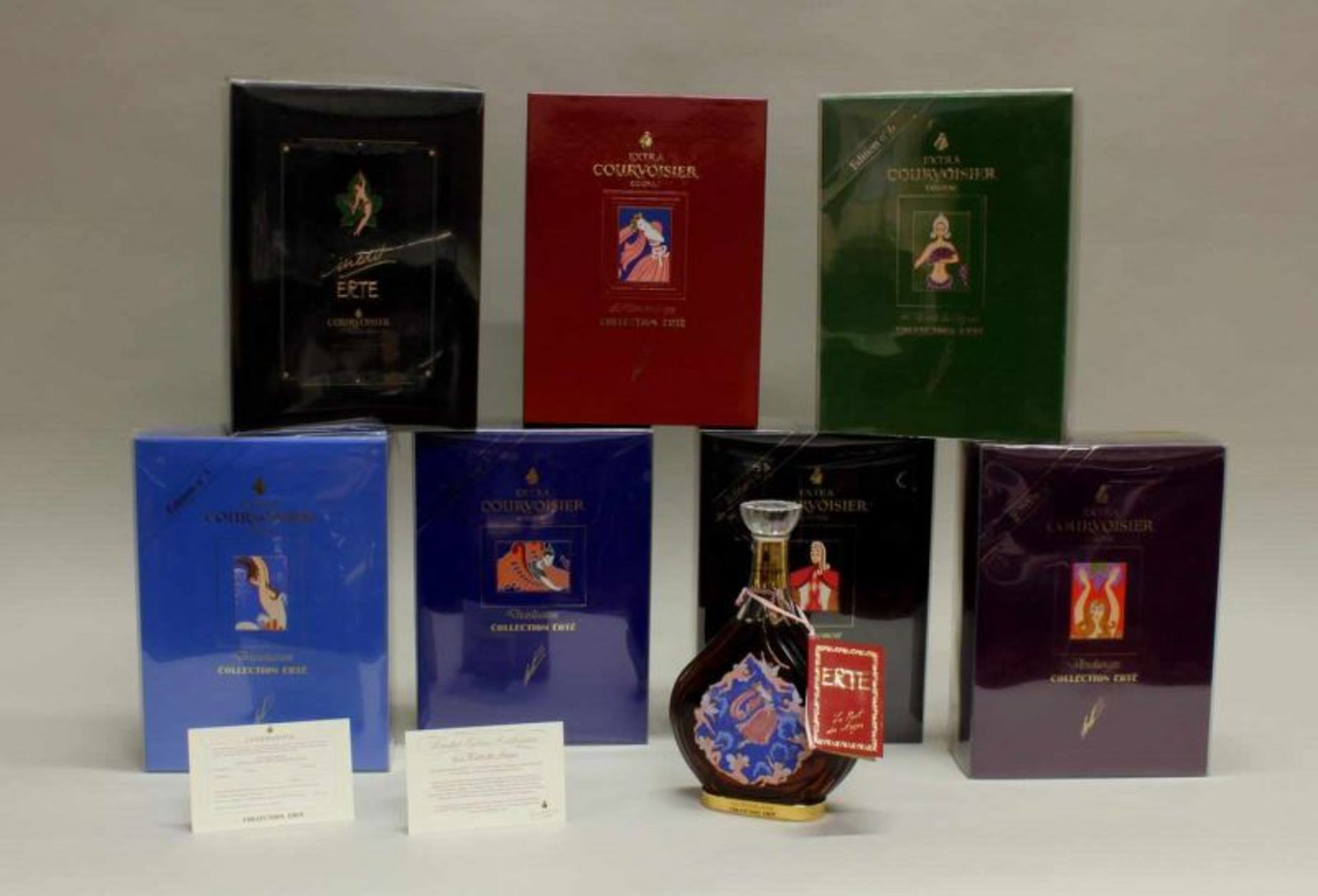 7 Flaschen Cognac, "Courvoisier Cognac Collection Erté", 40 % vol, Flaschen und Originaletuis nach