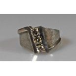 Ring, WG 585, 3 Brillanten zus. ca. 0.30 ct., ca. 8 g, RM 17 20.00 % buyer's premium on the hammer