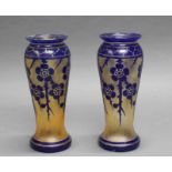 Paar Vasen, um 1925, Glas, lüstrierend, floraler Überfangdekor in Blau, 25 cm hoch, Randchips 20.