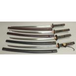 4 Katanas, Japan, 19. Jh., verschiedene Ausführungen, je mit Scheide, ca. 95-99 cm hoch, starke