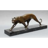 Bronze, dunkelbraun patiniert, "Panther", am Hinterfuß bezeichnet "Bronze", 49 cm lang, auf