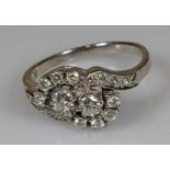 Ring, WG 750, 2 Brillanten zus. ca. 0.20 ct., 16 Besatz-Brillanten, 3 g, RM 17.5 20.00 % buyer's