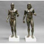 Paar Museumsrepliken, patiniert, nach den "Bronzestatuen von Riace", jeweils bezeichnet DMG, auf