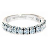 Memoire Ring 585/-WG, 80er Jahre Ringkopf ausgefasst m. 12 Brillanten, zus. ca. 0,84 ct. tw p. Mit