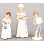 3 Kinderfiguren Porzellan, Kgl. Kopenhagen/B&G, 20.Jh. 2x Mädchen m. Puppe, 1x Junge in kurzen