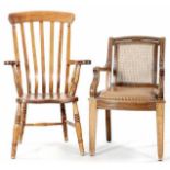 2 Armlehnstühle Eibe bzw. Eiche, England, 20.Jh. 1x sog. "Windsor Chair" u. 1x belederte