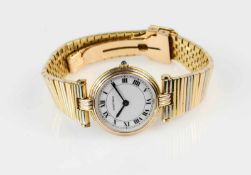 Damenarmbanduhr Cartier, Schweiz, 1982, Modell Vendome, 750 Gelb-, Weiß- und Roségold, kreisförmiges