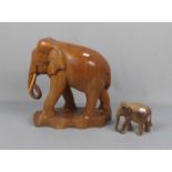 FIGURENPAAR: "Elefanten", Holz, geschnitzt, Afrika, 2. Hälfte 20. Jh.; in leichter Stilisierung