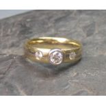 RING, 585er Gelbgold (5,5 g), besetzt mit Brillanten von insgesamt 0,26 ct. (VSI / TOP WESS), Gr.