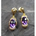 OHRSTECKER / earstuds, 750er Gold (5,8 g), besetzt mit je einem Amethysten und 10 kleinen