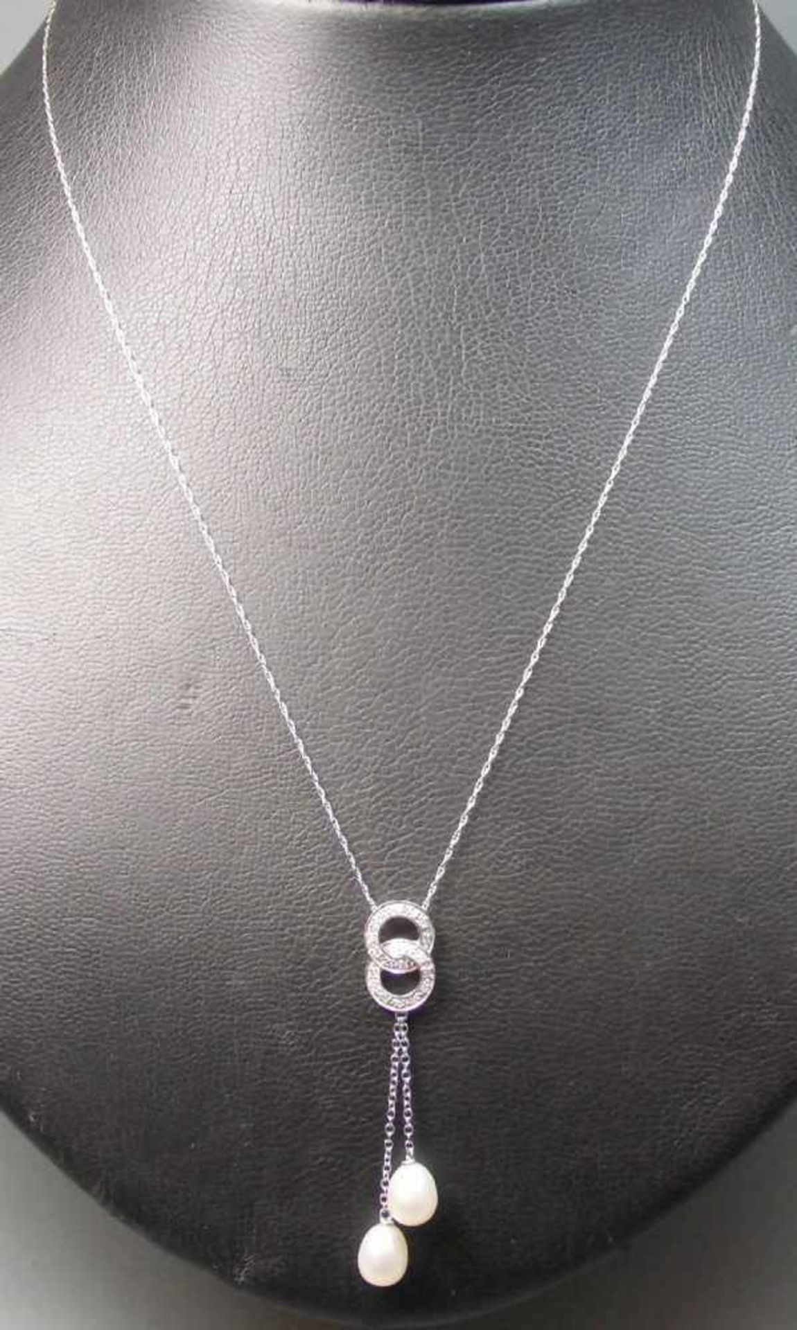 Y - KETTE / necklace, 585er Gold (2,7 g), zwei ineinander verschlungene Ringe, darunter zwei