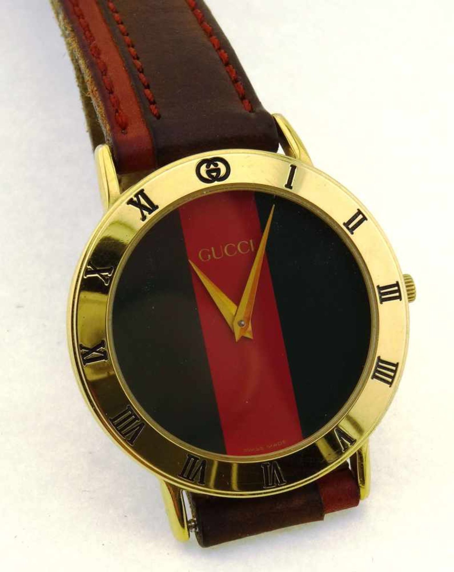 Herrenuhr Gucci Quarzuhr im dbl. Gehäuse mit Lederband, Durchmesser 33mm, Modell 3000.2.M, Uhr läuft