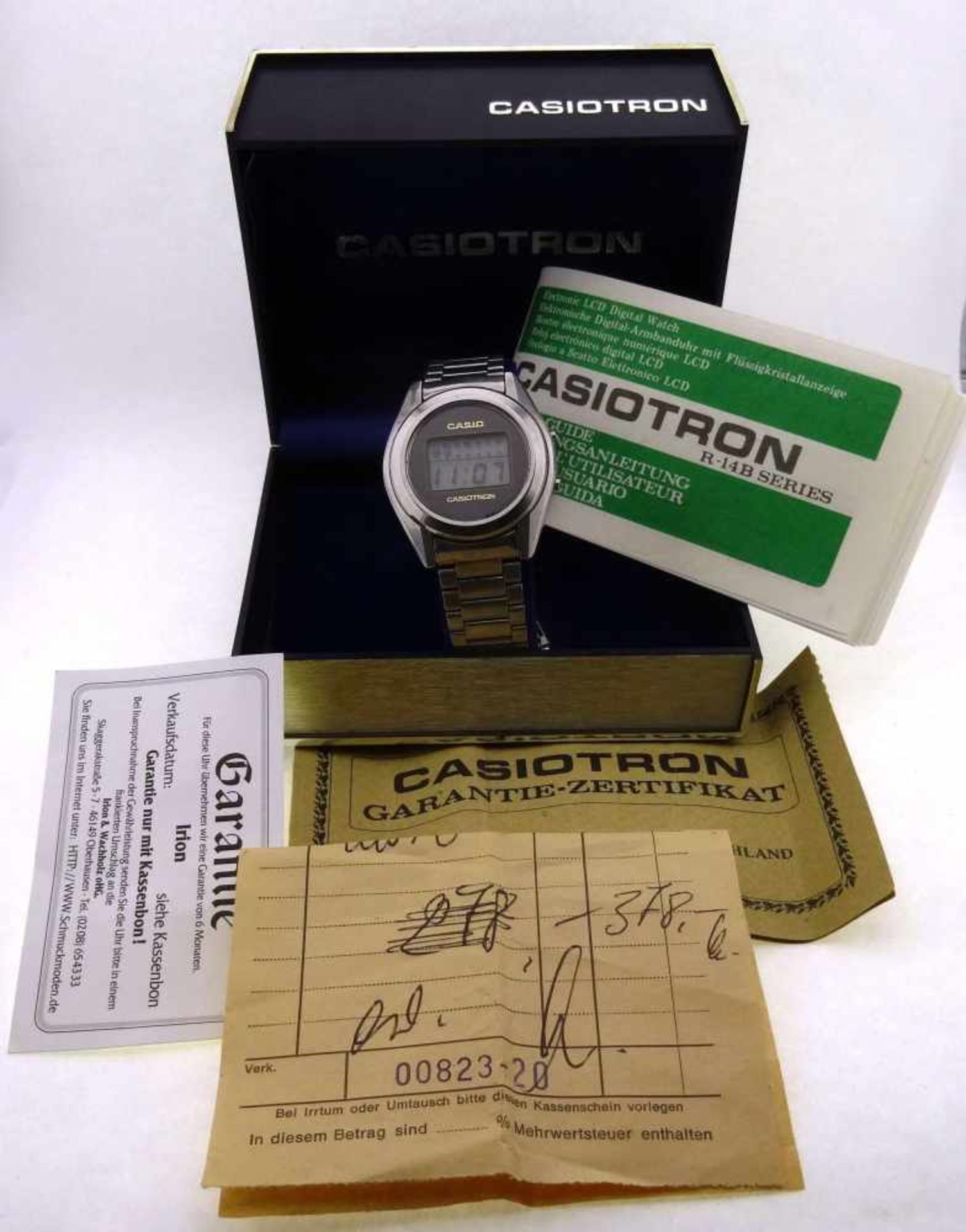 Herrenuhr Casiotron R-14 mit Original Kaufbeleg aus 1976, mit Box und Papieren, Uhr läuft, Zustand